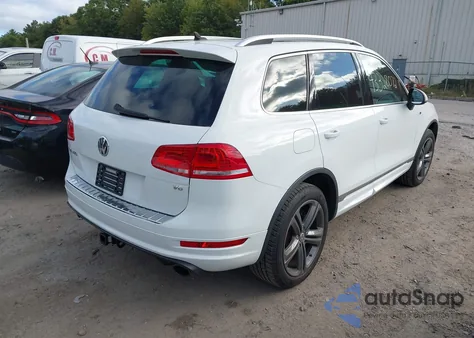 2014 Volkswagen Touareg 3.6L R-Line z USA, uszkodzony, nr VIN WVGDF9BP3ED006854